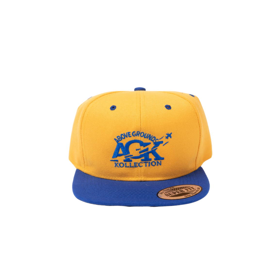 ABOVE GROUNDS KOLLECTION SNAPBACK HAT [YELLOW/BLUE]